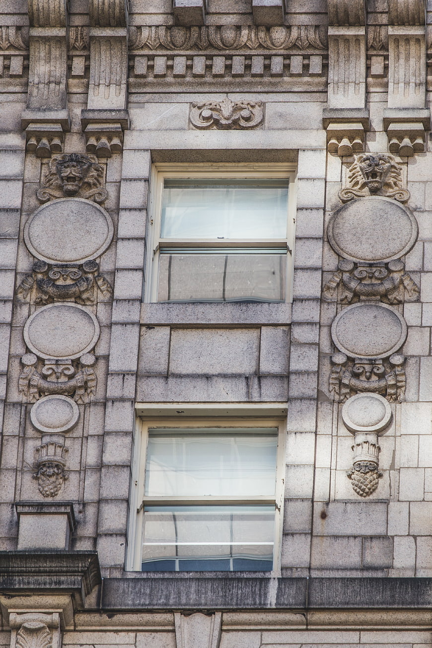 Ornate Stone Building Facade with Symmetrical Windows