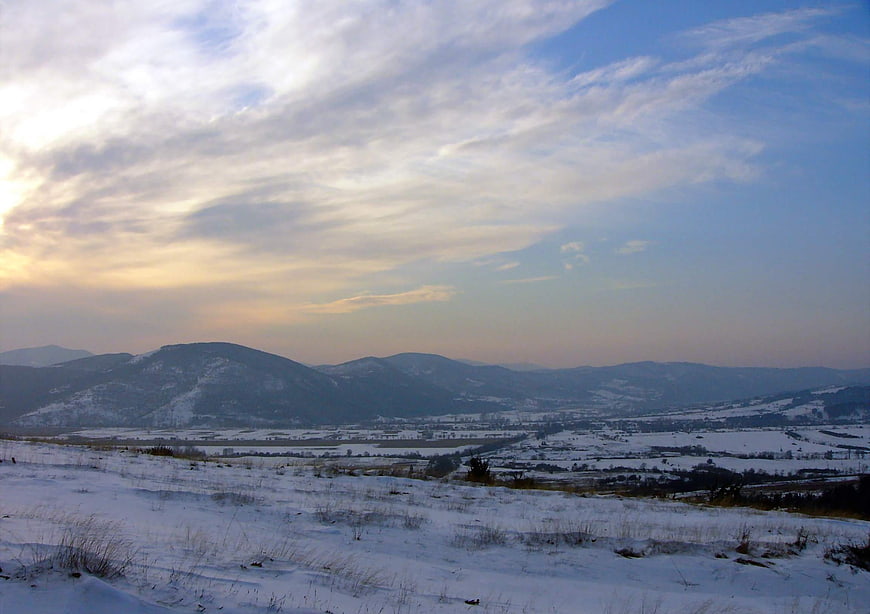 Snowy Winter Mountain Landscape at Sunset