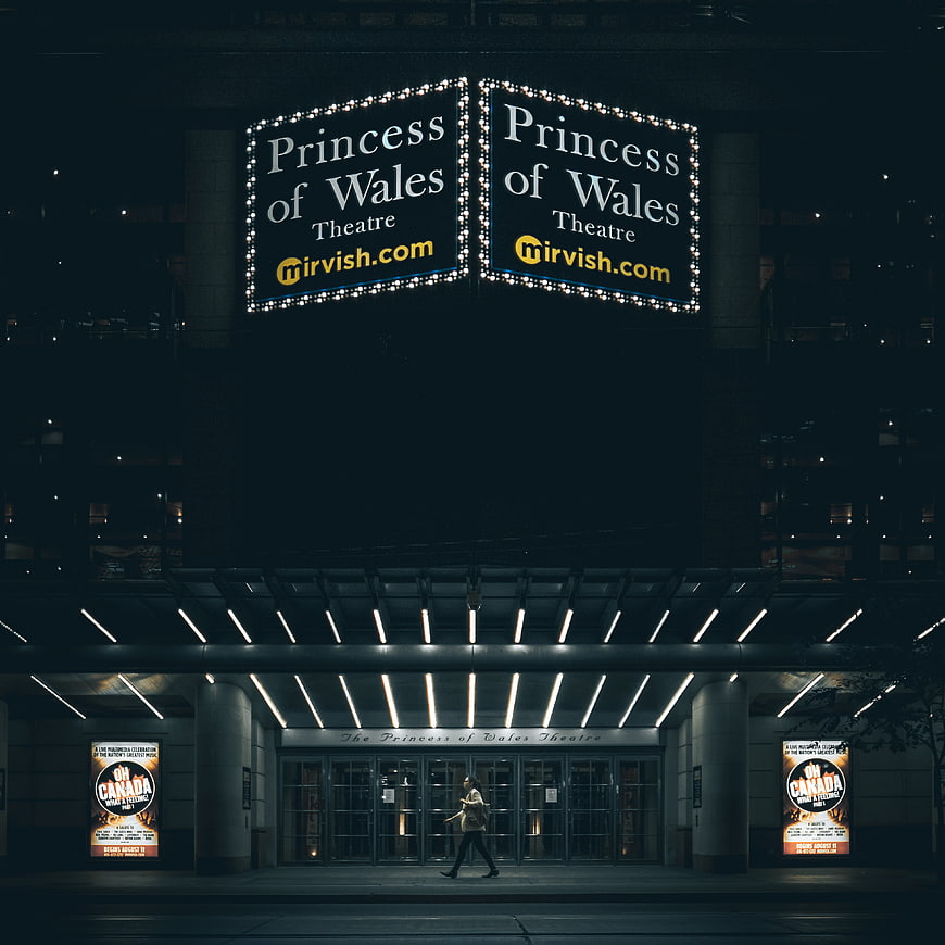 Princess of Wales Theatre Night Exterior with Pedestrian