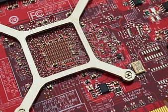 Close-up of red computer graphics card circuit board