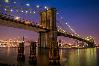 Brooklyn Bridge Night View with Manhattan Skyline Reflection