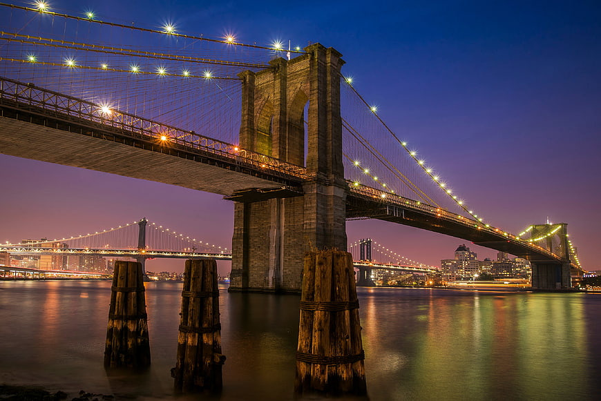 Brooklyn Bridge Night View with Manhattan Skyline Reflection