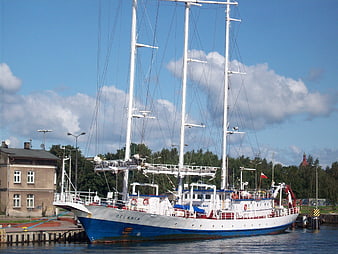 Three-masted sailing ship Oceania docked in harbor