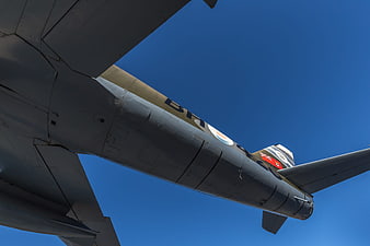 Vintage Military Aircraft Fuselage Against Blue Sky