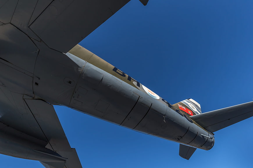 Vintage Military Aircraft Fuselage Against Blue Sky