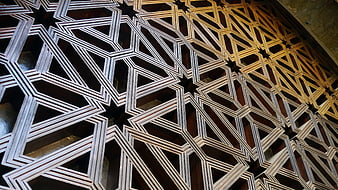 Intricate Islamic geometric wooden ceiling pattern