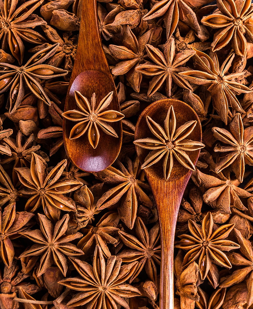 Top View of Star Anise Spices on Wooden Spoons