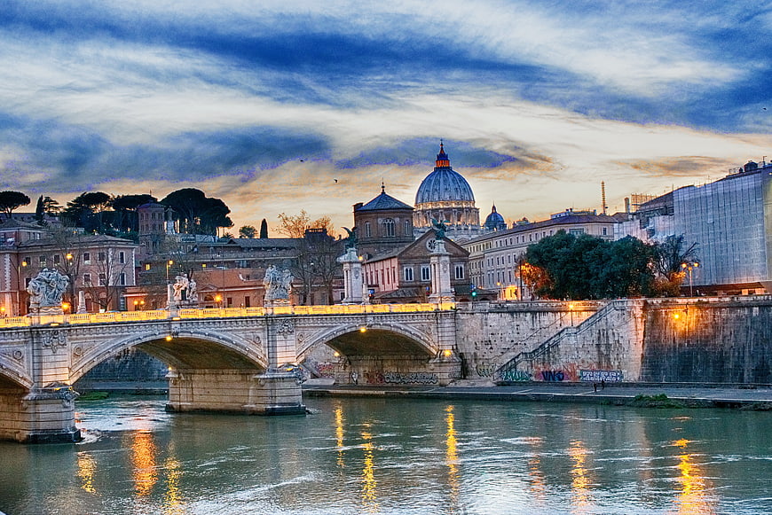 Ponte Vittorio Emanuele II and St. Peter's Basilica in Rome at Dusk