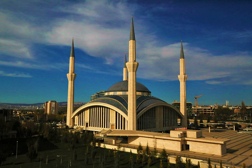 Modern Mosque with Minarets and Blue Sky