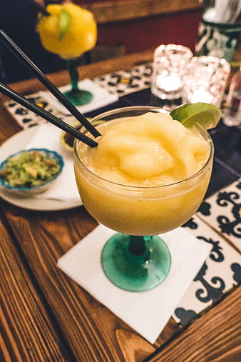 Frozen Mexican Margarita with Lime Garnish and Guacamole