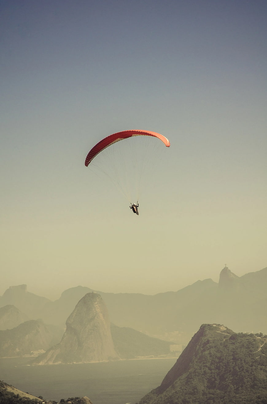 Paraglider Soaring Over Rio de Janeiro Mountains