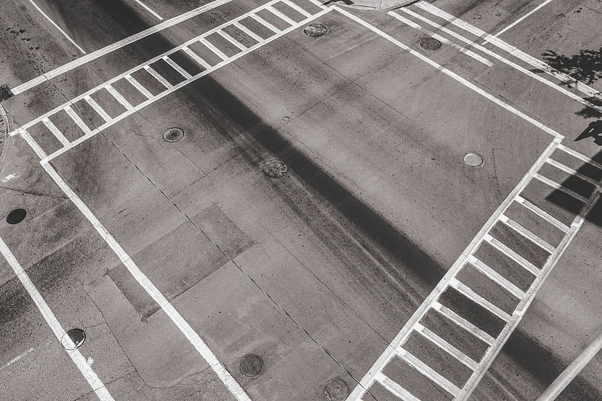 Aerial View of Empty Crosswalk on Concrete Road