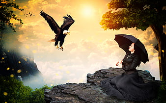 Woman in black dress with umbrella facing flying eagle in fantasy landscape