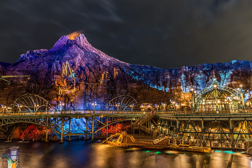 Night view of Mysterious Island volcano and pier at DisneySea