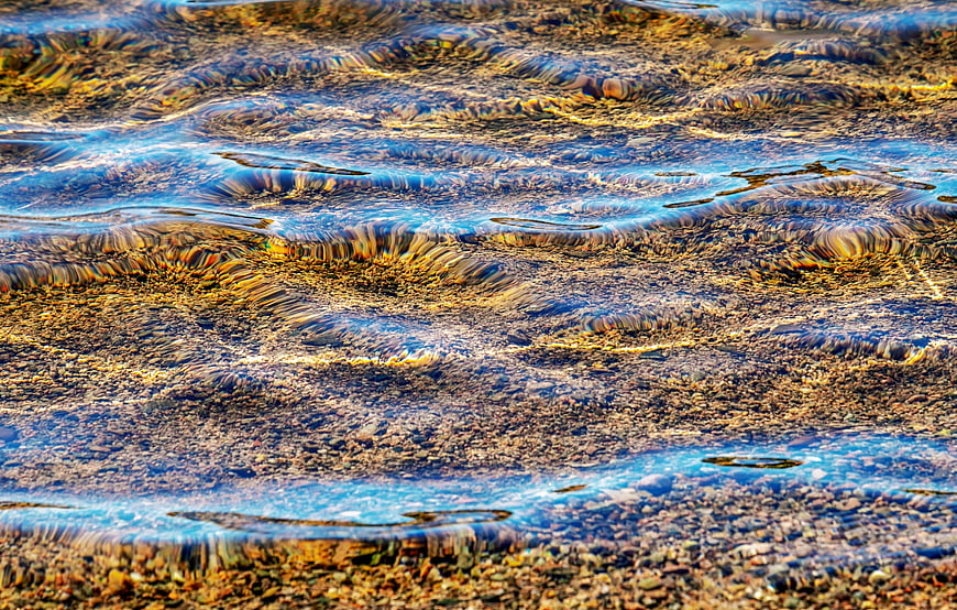 Abstract Shallow Water Ripples Over Pebbles