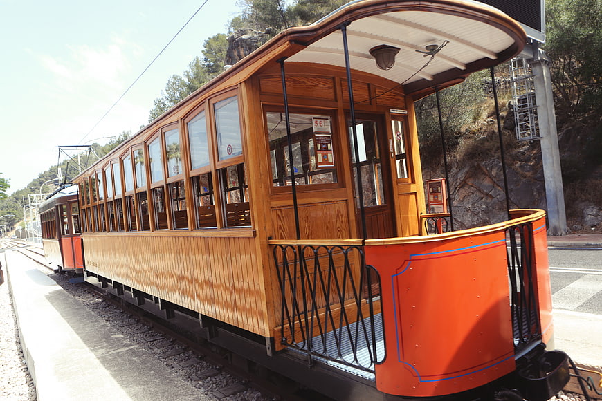 Vintage Wooden Funicular Train on Mountain Tracks