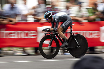 Professional Cyclist Sprinting on Time Trial Bike