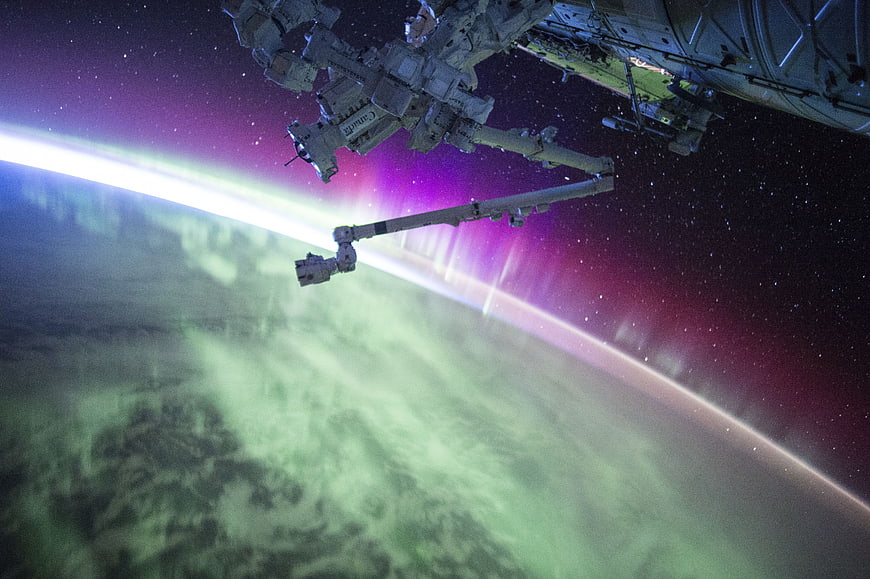 International Space Station with Aurora Borealis over Earth