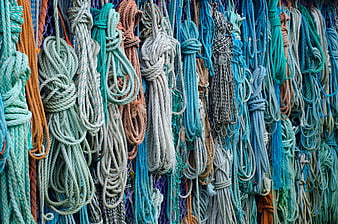 Colorful Hanging Fishing Ropes and Nautical Cordage