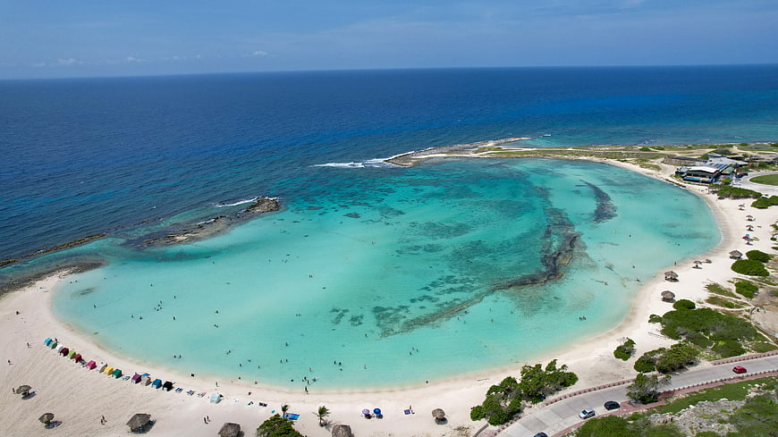 Aerial View of Turquoise Lagoon and White Sandy Beach