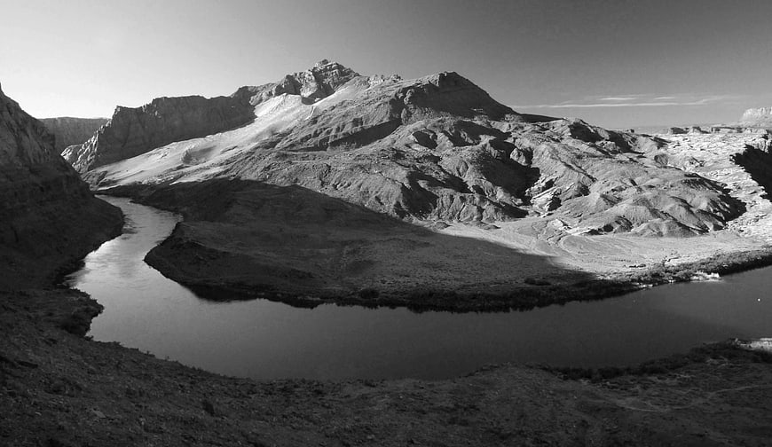 Black and white landscape of Mount Etna with winding river
