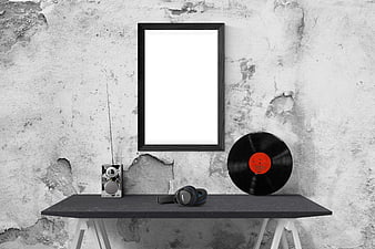 Black Picture Frame Mockup on Concrete Wall with Vinyl Record