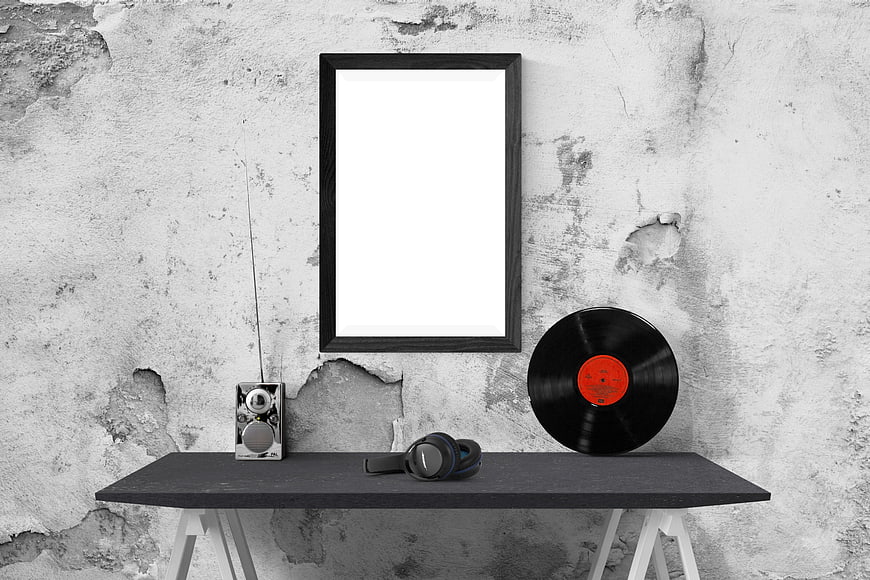 Black Picture Frame Mockup on Concrete Wall with Vinyl Record