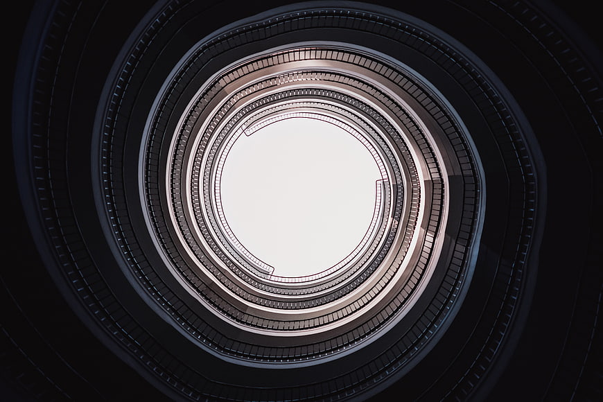 Abstract futuristic circular tunnel with concentric rings and light