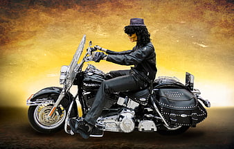 Biker in leather jacket and hat riding black Harley-Davidson motorcycle