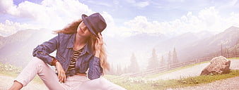 Woman in Fedora Hat Sitting in Mountain Landscape