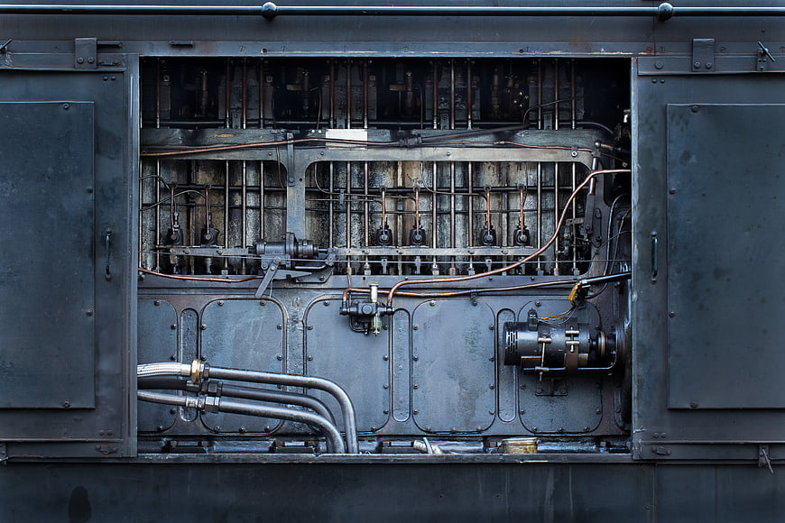 Close-up of vintage steam locomotive engine mechanics