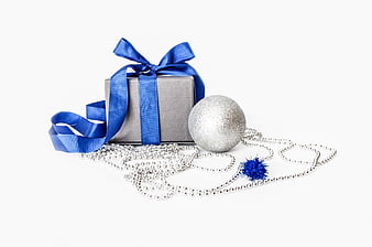 Silver Gift Box With Blue Ribbon And Christmas Ornament