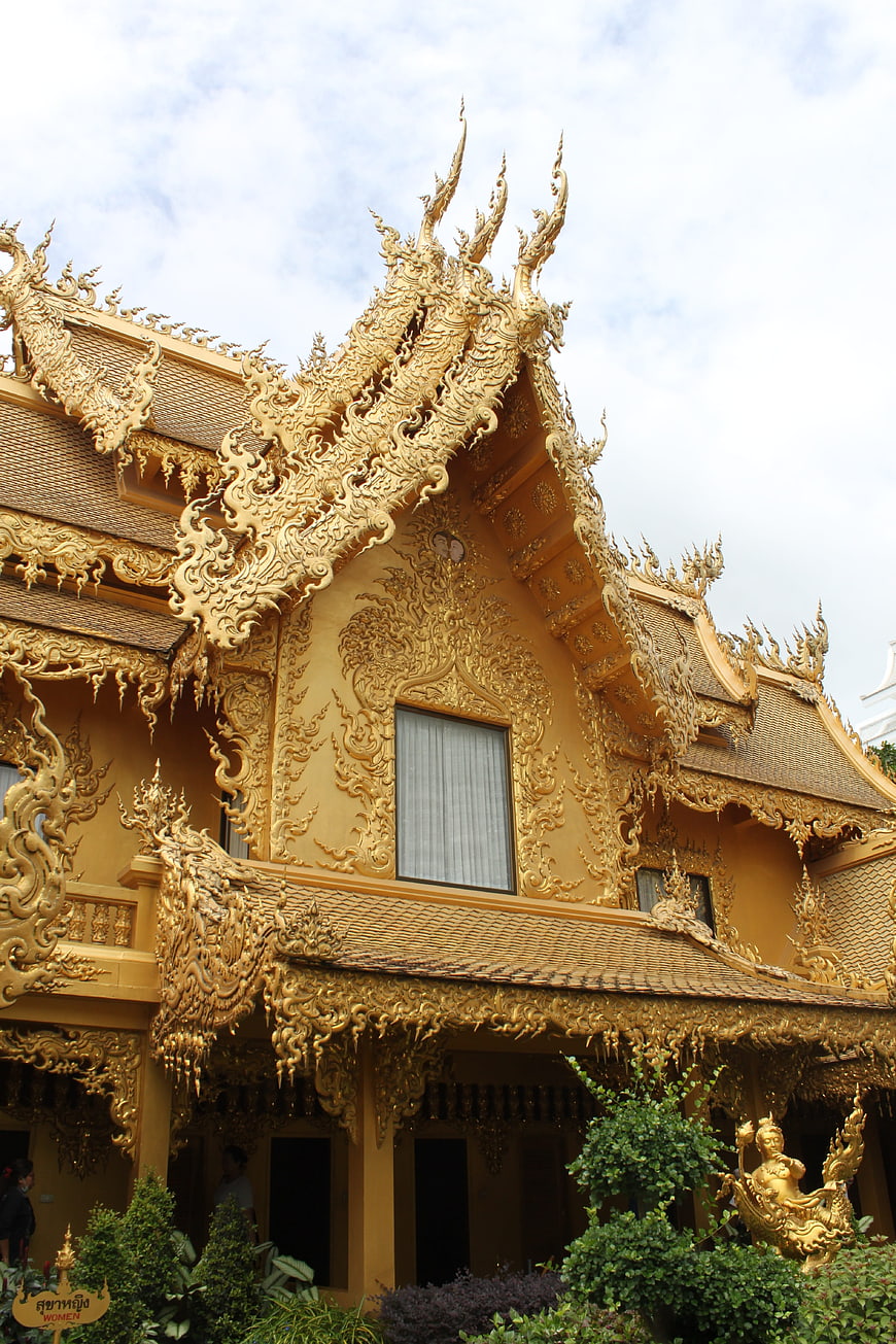 Golden Thai Temple Architecture with Intricate Roof Details