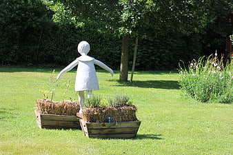 White Girl Statue in Wooden Garden Planters