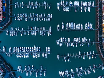 Aerial top view of marina with docked boats