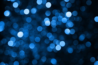 Abstract Blue Bokeh Background with Glowing Lights