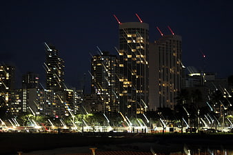 Night cityscape with light streaks and illuminated skyscrapers