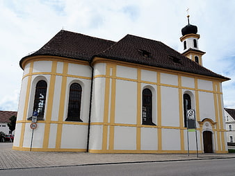 Yellow and white church with onion dome in Beilngries
