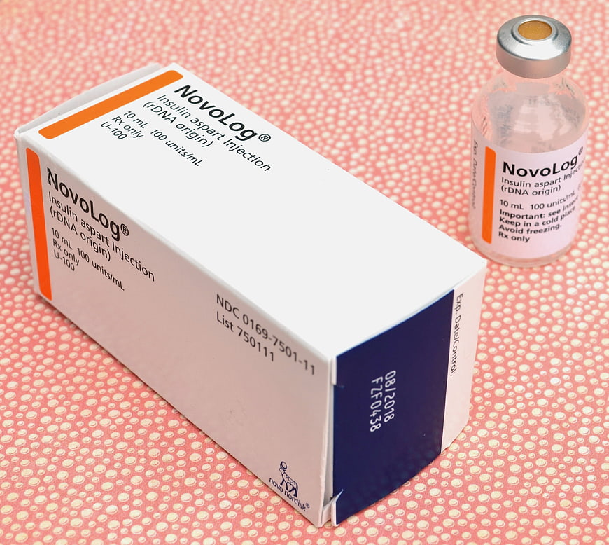 NovoLog Insulin Box and Vial on Pink Background