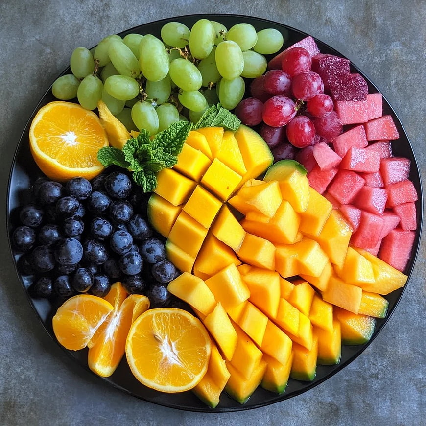 Colorful Fruit Platter with Mango, Grapes, and Watermelon