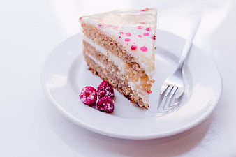 Slice of Raspberry Cake on White Plate with Fork