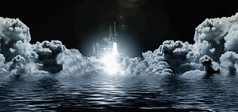 Space Shuttle Launching Through Clouds Over Water at Night