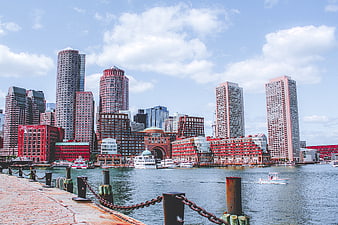 Boston Waterfront Skyline with Harbor Boats and Pier