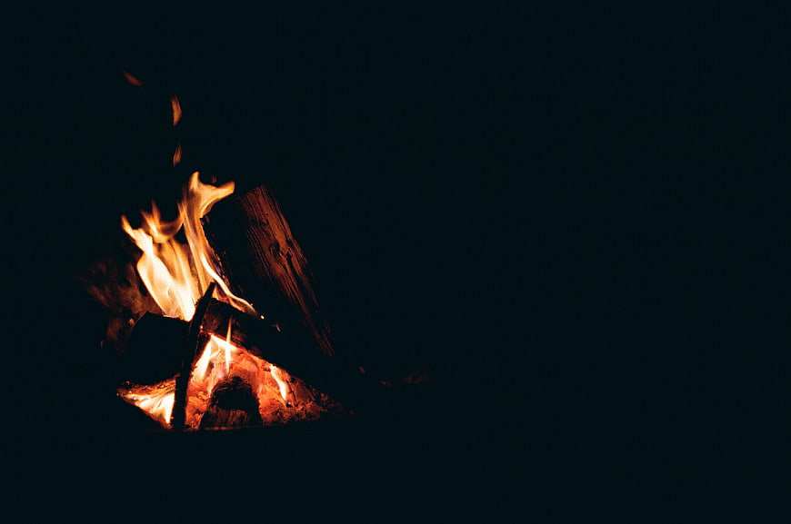 Campfire Burning at Night with Dark Background