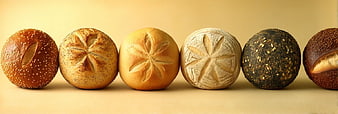 Assorted Artisan Bread Rolls on Beige Background