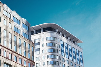 Modern Office Building Facade Against Clear Blue Sky