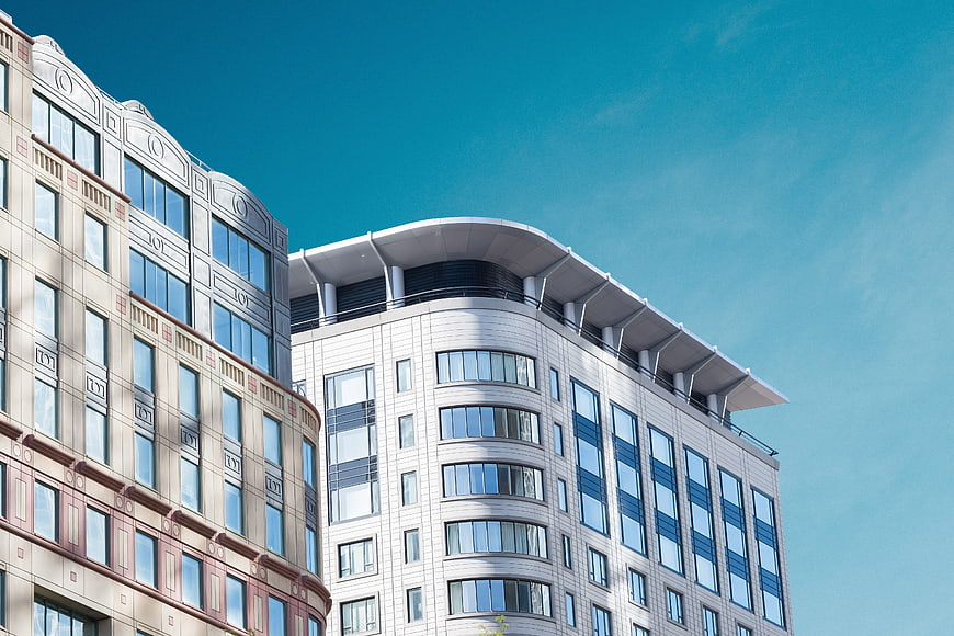 Modern Office Building Facade Against Clear Blue Sky