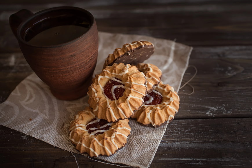 Rustic Chocolate Cookies with Coffee on Wooden Table