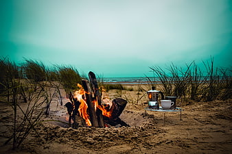 Beach Campfire with Coffee Setup at Dusk