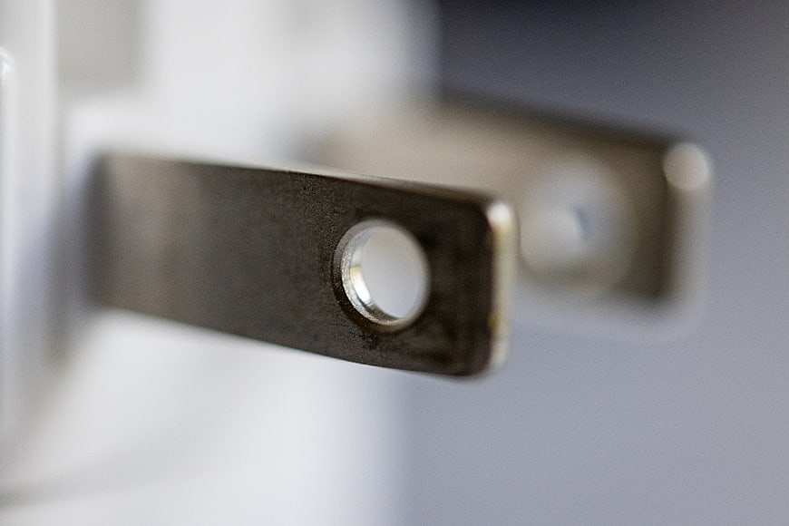 Close-up of metal electrical plug prongs